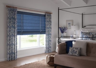 Blue Graber Roman shades and drapery