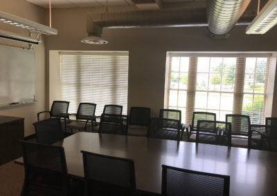 White blinds in conference room